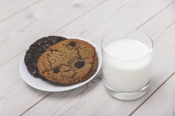 Close up of cookies and milk glass