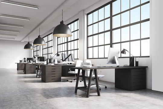 Office interior with massive ceiling lamps