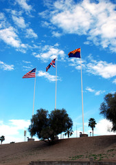 The flags of Arizona, Great Britain and the USA near London Bridge in Lake Havasu City, Arizona