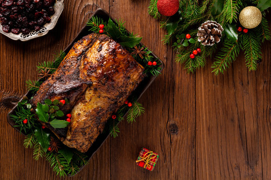 Roast pork loin with Christmas decoration.