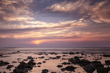 Fototapeta na wymiar Landscape of sea with rock in sunset.