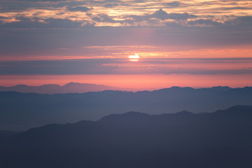 Sunrise on mountain hill in Thailand