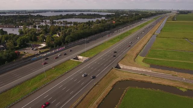 Highway in Holland. Aerial perspective, camera lowers.