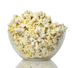 salty popcorn on a white background. trip to the cinema