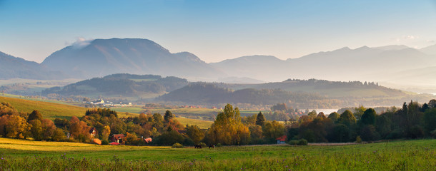 Slovakia autumn sunny morning panorama. Rural fall scene