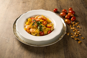 Pumpkin farfalle with shrimp and cherry tomato