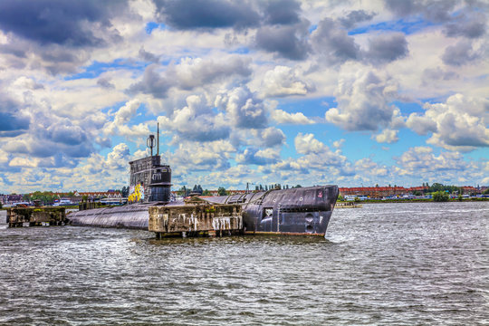 NETHERLANDS, AMSTERDAM - AUGUST 30, 2011: Old submarine on the NDSM-Werf, sponsored by the city, the artistic community called Kinetisch North, a center for underground culture. HDR Image.