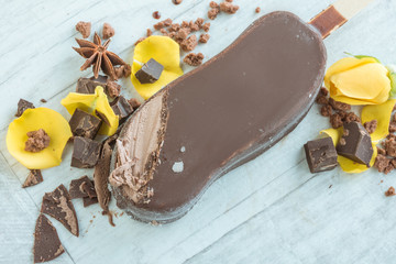 Chocolate ice cream on wooden table
