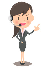 ヘッドセットをつけて指さす女性会社員