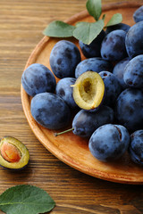 Organic purple plums closeup