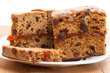 Muffins with raisins on a white plate