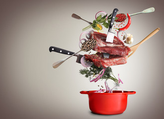 Meat and beef meatballs with vegetables and utensils