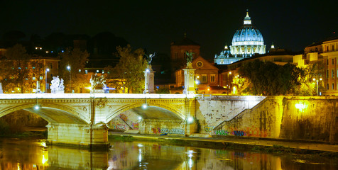 The Bridges over River Tiber and St Peters Basilica in Rome by night