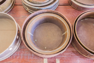 Phuket, Thailand - Mar 26, 2016 : Old metal sieves for mining work demonstrated at Phuket Mining Museum, Thailand