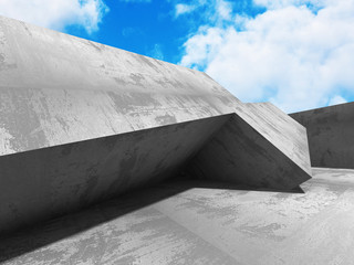 Concrete abstract architecture on cloudy sky background