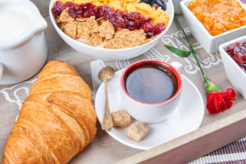 French breakfast on a wooden tray