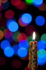 Candle and Christmas background