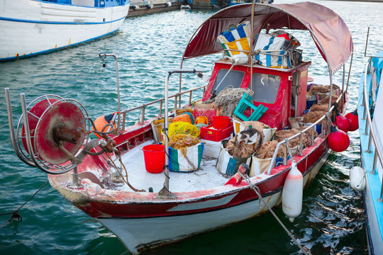 Fishing boat with fishing gear in Limassol Old Port.