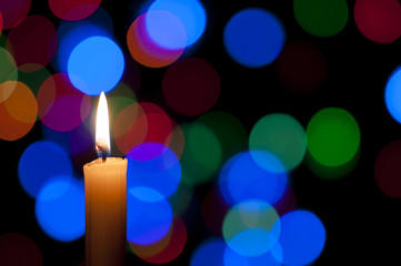 Candle and Christmas background