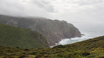 Cloudy autumn day at Cape Roca, Sintra, Portugal. Cape Roca (Cabo da Roca) is the westernmost point of continental Europe.