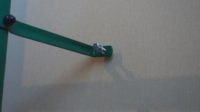 hand spins into the wall screw wrench