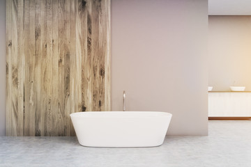 Fototapeta na wymiar Close up of a white bathtub, toned