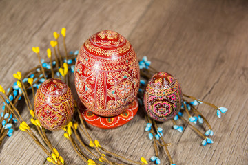 beautiful hand-painted Easter eggs for , three , red patterned like substrate