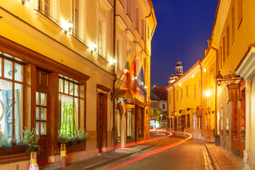 Fototapeta na wymiar Picturesque Street at night in Old Town of Vilnius, Lithuania, Baltic states.