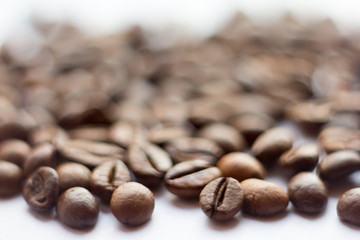 Close up beans on a white background. Coffee  the entire screen for the . Roasted   brown. Lots of  in high definition.