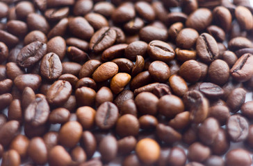 Close up beans on a white background. Coffee  the entire screen for the . Roasted   brown. Lots of  in high definition.
