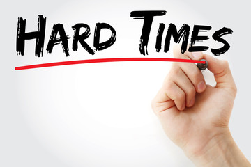 Hand writing Hard times with marker, concept background