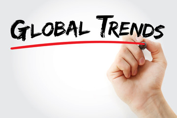 Hand writing Global trends with marker, concept background