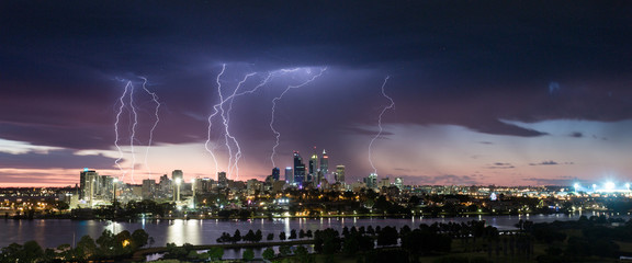 Fototapeta na wymiar Stunning multiple lightning strikes over Perth CBD