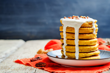 Carrot pancakes with sweet Greek yogurt sauce and pecan sprinkli