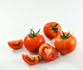 Fresh tomatoes on white background. Organic vegetable for healthy eating.