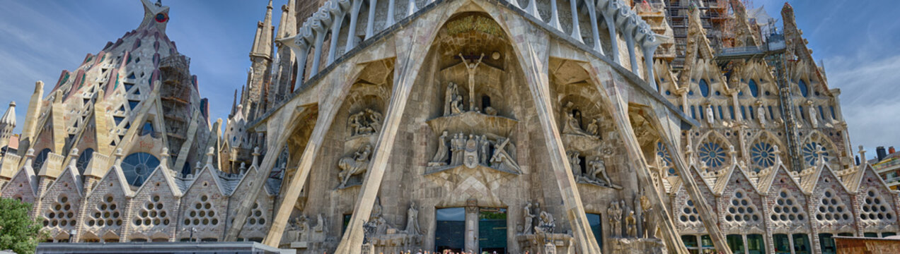 Detailed panoramic view on the bottom part of Sagrada Familia in Barcelona, Spain