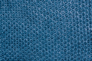 Knitted fabric textured background.
