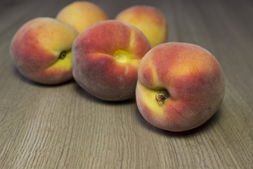 peaches on a wooden table