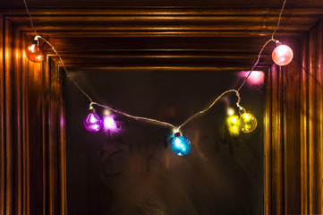 Christmas lights glowing in the dark.