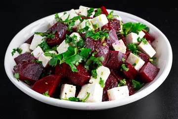 Healthy beetroot, feta cheese salad with parsley