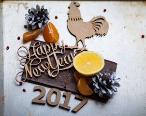 2017 Wooden numbers are on the dinner table with decorations