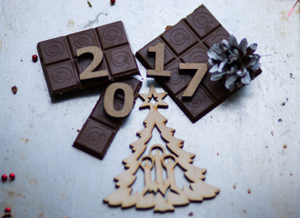 2017 Wooden numbers are on the dinner table with decorations