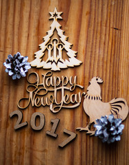 2017 Wooden numbers are on the dinner table with decorations