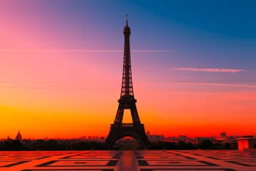 Fototapeten The Eiffel Tower in Paris at sunrise, France © INTERPIXELS