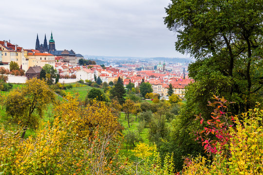 Autumn Prague panorama from Prague Hill with Prague Castle, Vltava river and historical architecture. Concept of Europe travel, sightseeing and tourism.
