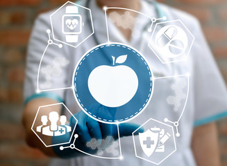 Doctor presses apple button on virtual screen on background of medical health care safety icon....