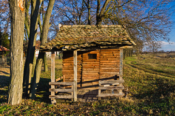 Retro wooden bus station at rural agricultural area of north Serbia