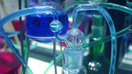 Laboratory equipment closeup and colorful liquids