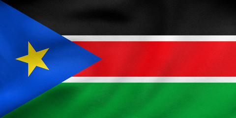 Flag of South Sudan waving, real fabric texture