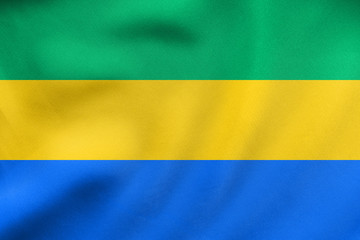 Fototapeta premium Flag of Gabon waving, real fabric texture
